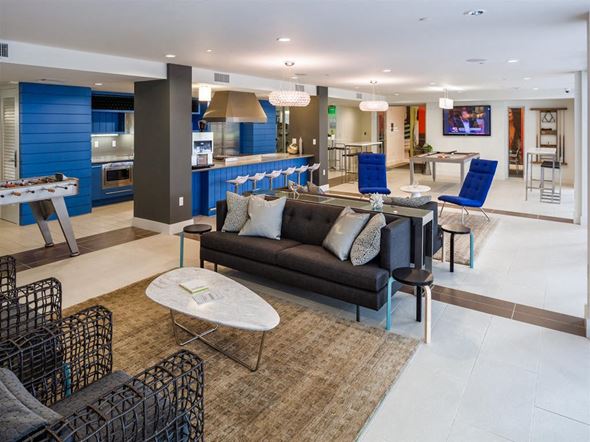 Marina Del Rey apartment for rent - a living room and kitchen with blue chairs and a couch