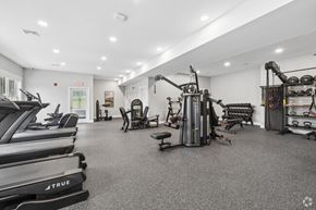 Derry apartment for rent - A gym with treadmills, weights, and exercise equipment.