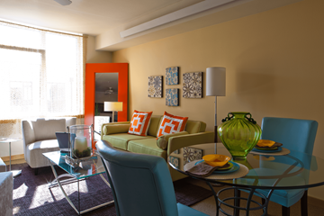 Portland apartment for rent - a living room with a glass table and a couch