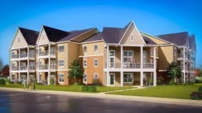 Frackville apartment for rent - A large apartment complex with multiple balconies and a clear blue sky.