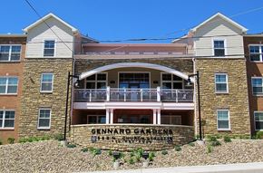 Hazleton apartment for rent - A building with a sign that says "Gennaro Gardens".