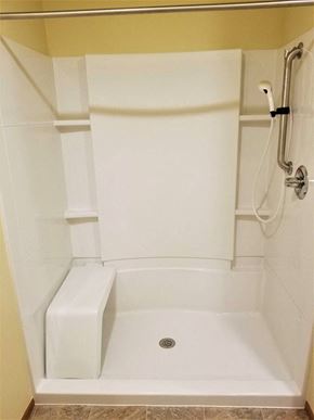 Lake Ariel apartment for rent - A white bathtub with a drain in the middle of it.