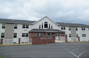 Mount Pocono apartment for rent - The front of a building with the name KNOB CREST on it.
