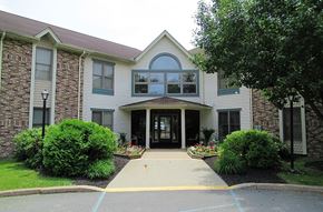 Waymart apartment for rent - A building with a front yard and a driveway.