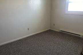 Elysburg apartment for rent - A room with a window and a carpeted floor.