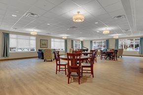Harrisburg apartment for rent - A large room with wooden floors and tables.