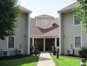 Mcveytown apartment for rent - A building with a circular window on the roof.