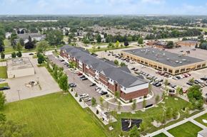 Sterling Heights apartment for rent - an aerial view of an office building and parking lot