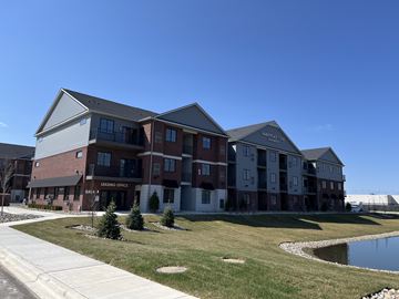 Sterling Heights apartment for rent - A large building with a sign that says "Back Office" on it.