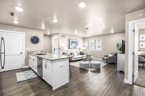 Sterling Heights apartment for rent - A modern kitchen with white cabinets and a large island.