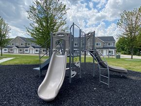 Shelby Township apartment for rent - swings and slides at the preserve at green trees apartments sc
