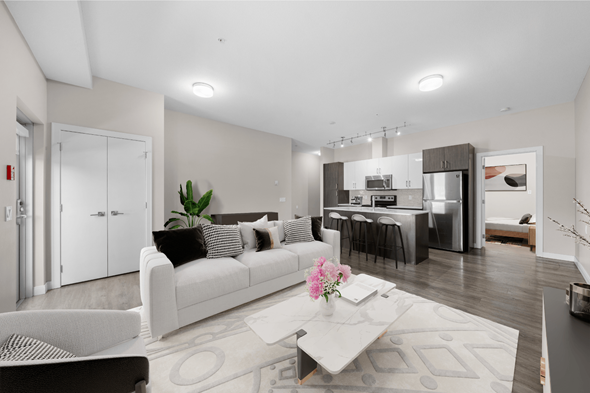 Calgary apartment for rent - a living room with a couch and a table