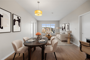Airdrie apartment for rent - a living room and dining room with a table and chairs