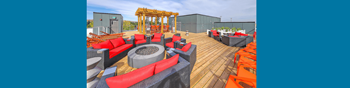 Spectacular rooftop patio with bbq stations, firepits, stylish furniture