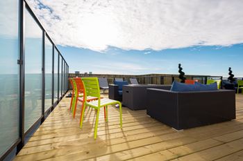 Spectacular rooftop patio with bbq stations, firepits, stylish furniture