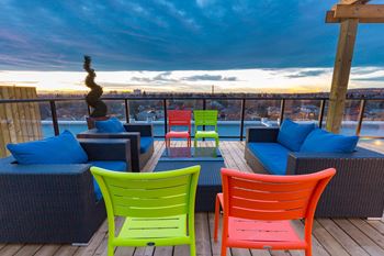 Spectacular rooftop patio with bbq stations, firepits, stylish furniture