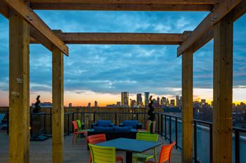 Spectacular rooftop patio with bbq stations, firepits, stylish furniture