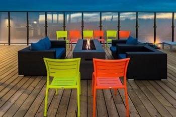Spectacular rooftop patio with bbq stations, firepits, stylish furniture