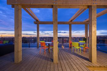 Spectacular rooftop patio with bbq stations, firepits, stylish furniture