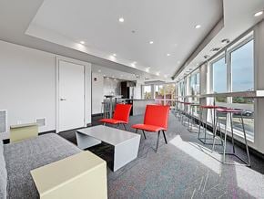 Calgary apartment for rent - A conference room with a long table and chairs.