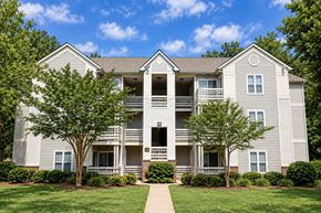 Charlotte apartment for rent - A two-story apartment building with a balcony on the second floor.