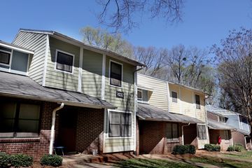 Charlotte apartment for rent - Apartment building with a clear blue sky in the background.