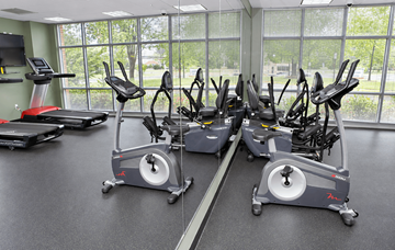 Charlotte apartment for rent - A gym with treadmills and elliptical machines.