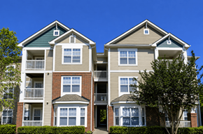 Charlotte apartment for rent - A large two-story apartment building with balconies and multiple windows.
