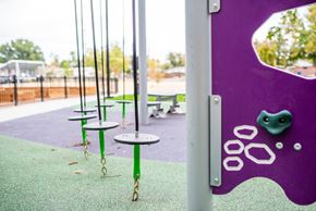 Aurora apartment for rent - Close up of playground equipment, stepping stools on elongated secured chains