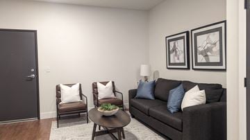 Aurora apartment for rent - a living room with a couch and a coffee table