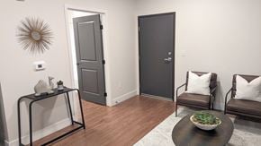 Aurora apartment for rent - a living room with two couches and a table