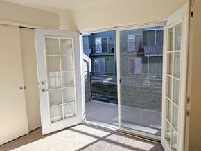 Aurora apartment for rent - French doors in main floor bedroom open up to patio