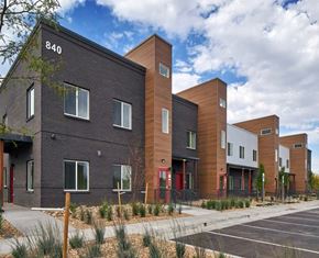 Aurora townhouse for rent - A picture showing D Building and part of the parking lot.