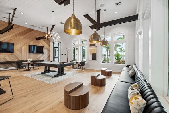 Orlando apartment for rent - a large living room with a pool table and couches