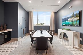 St. Petersburg apartment for rent - A modern dining room with a large table and chairs.