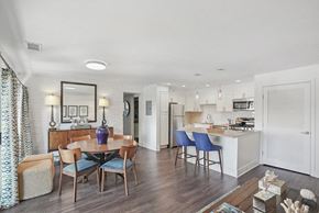 Annapolis apartment for rent - a spacious living room with a dining area and kitchen in the background