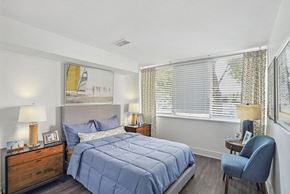 Annapolis apartment for rent - a bedroom with a bed and two windows