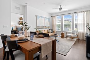 Clermont apartment for rent - a living room and dining room with a table and chairs