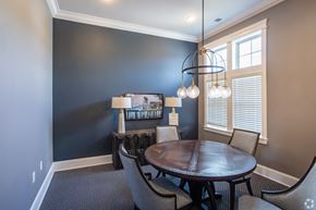 Murfreesboro apartment for rent - a dining room with a table and chairs and a chandelier