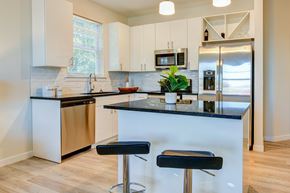 North Bergen apartment for rent - Modern apartment kitchen with stainless steel appliances at The Rail North Bergen