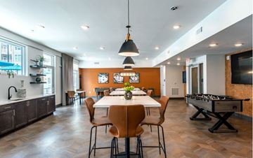 Kannapolis apartment for rent - a dining room with a table and chairs and a pool table