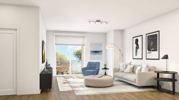 Belmar apartment for rent - A living room with a blue chair and a white couch.