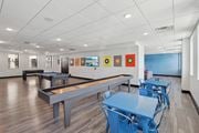 Plainfield apartment for rent - A room with a pool table and a ping pong table.