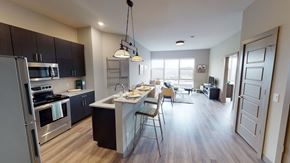 Hackensack apartment for rent - A kitchen with a dining table and chairs at Crossroads 389 Apartments, Hackensack