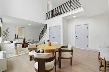 Fort Lee apartment for rent - A modern living room with a wooden table and chairs.