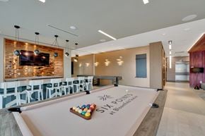 Bloomfield apartment for rent - a game room with a pool table and a scoreboard