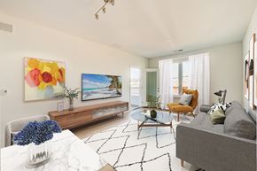 Belmar apartment for rent - A living room with a grey couch, a coffee table, a painting, and a window with curtains.