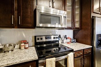Custom maple cabinetry with 42