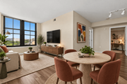 Arlington apartment for rent - A modern dining room with a round table and chairs.
