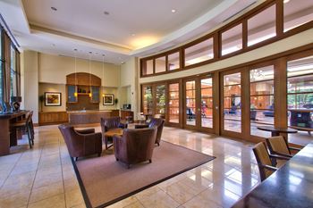 24-Hour business center with mac computers and work from home seating areas 